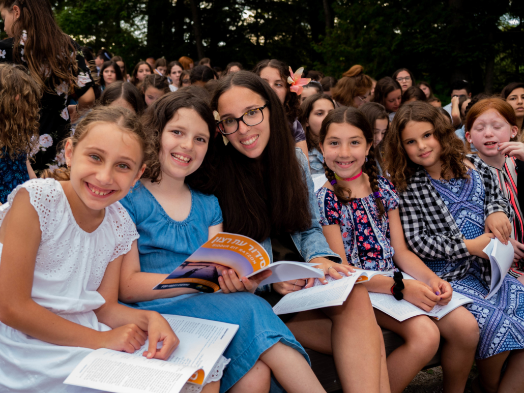 Camp Ramah students reading, learning about the Jewish culture is part of their experience.
