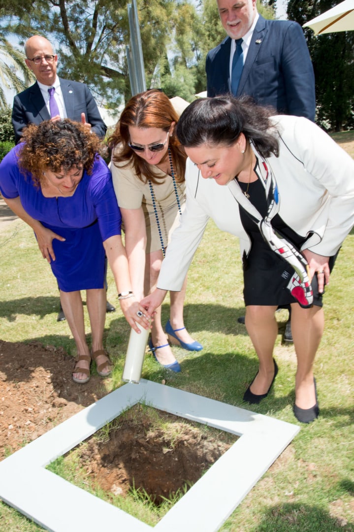 Sharon, Danna, and Naomi Azrieli lay the cornerstone for the new architecture building.