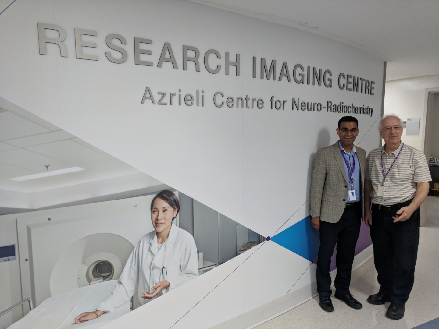 Dr. Neil Vasdev and Dr. Sylvain Houle at the CAMH brain imaging research centre.