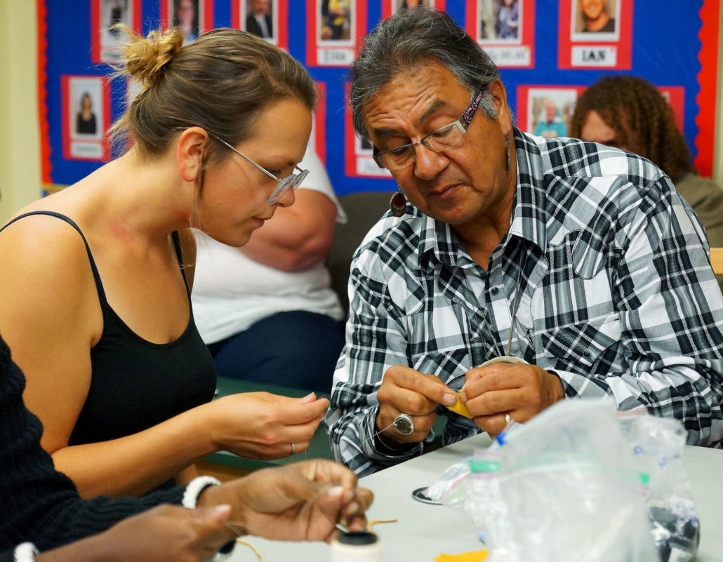 A high school teacher and elder working through training. 