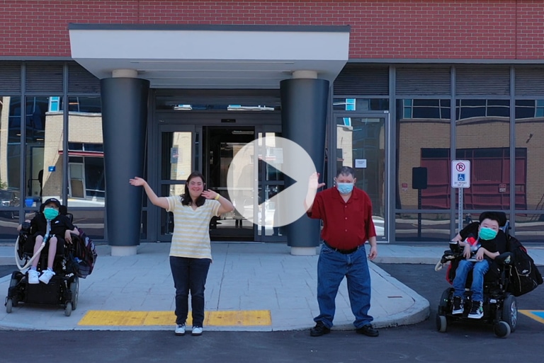 Residents in front of the Lou Fruitman Reena Residence